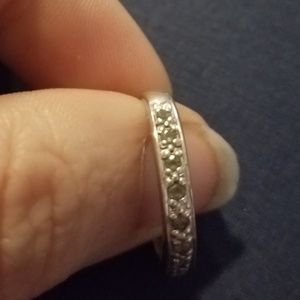 Genuine Alexandrite band set in 14 kt white gold